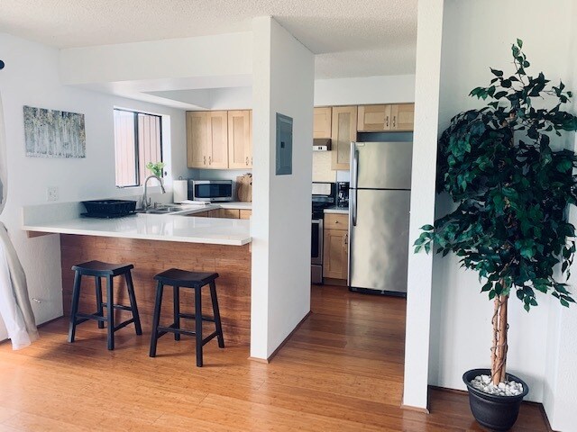 Modern kitchen features with stainless steel appliances - 75 -5706 Kalawa St