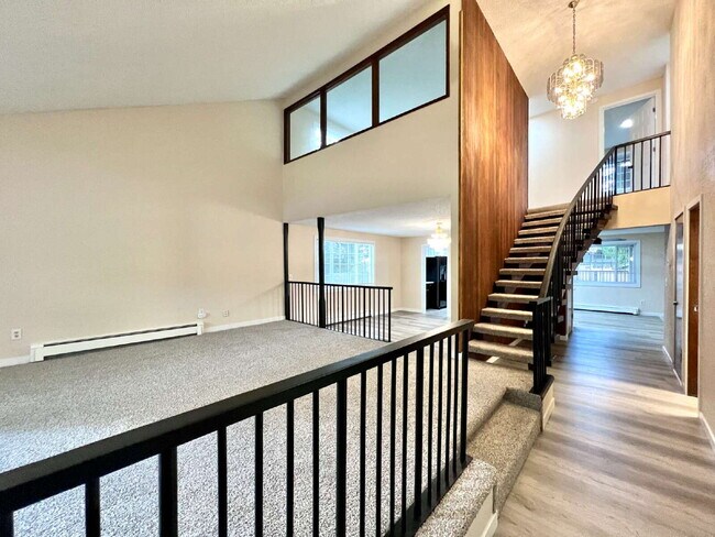 Building Photo - Spacious Living, Functional Comfort & Unbeatable Convenience