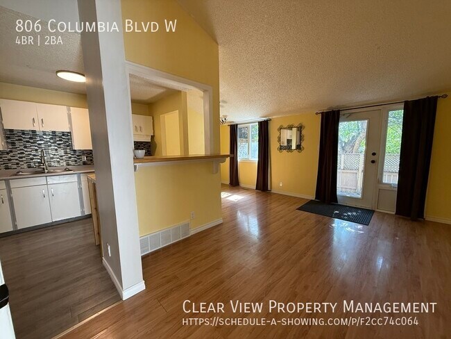 Building Photo - ?? Spacious 4-Bedroom Fenced Home in West ...