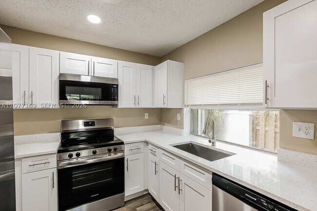 Building Photo - 1220 NW 89th Dr