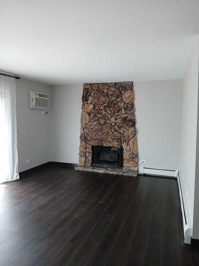 Livingroom with decorative fireplace - 15820 Orlan Brook Dr