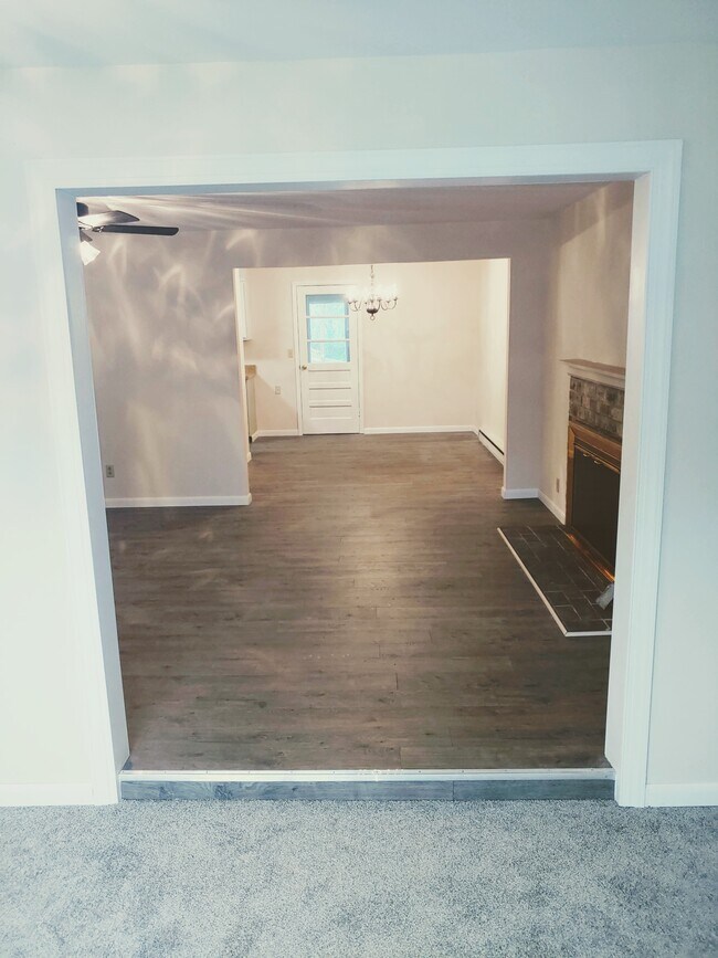 Living room looking into dining room - 11850 Village Heights Dr