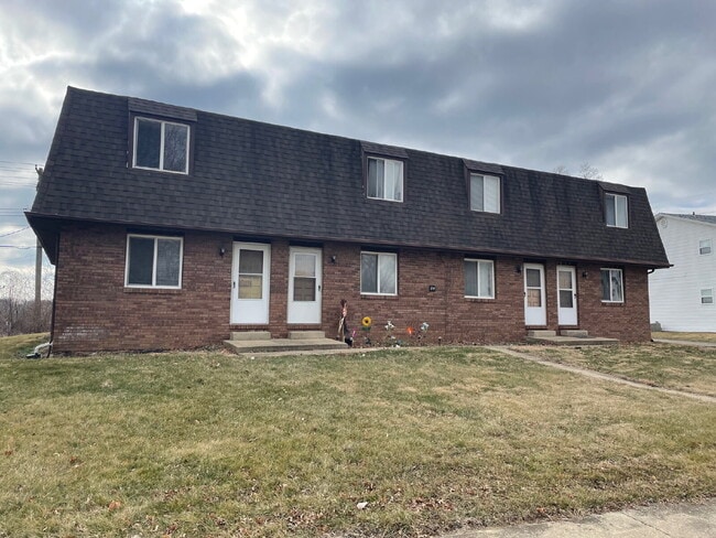Building Photo - Up Where We Belong — Spacious 2-Story Townhome with Basement
