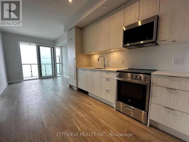 Photo du bâtiment - 430-4430 Square One Dr