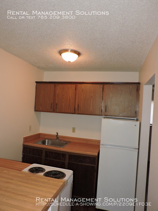 Building Photo - Aspen Apartments - Studio