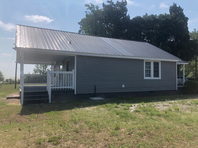 Lado de la casa - 381 Big Hill Rd