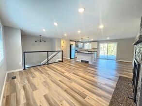Building Photo - 1721 E 58th Ave