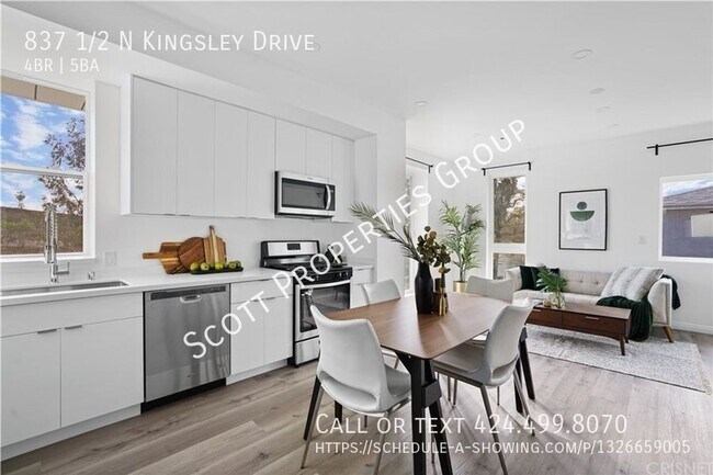Building Photo - Modern 2-Story Townhouse: 4 Bedrooms + 4.5...