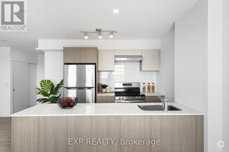 Building Photo - 100-100 Manett Crescent
