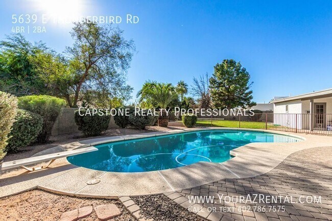 Building Photo - Gorgeous Spanish Styled Home with a Pool!