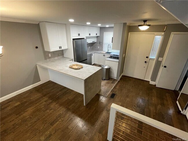 Foto del edificio - 18 Brewster Woods Dr