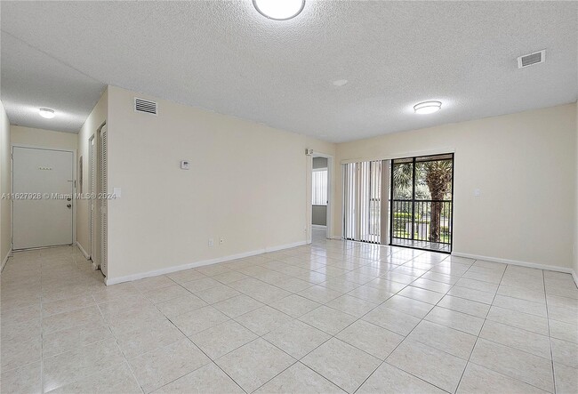 Building Photo - 10704 Royal Palm Blvd