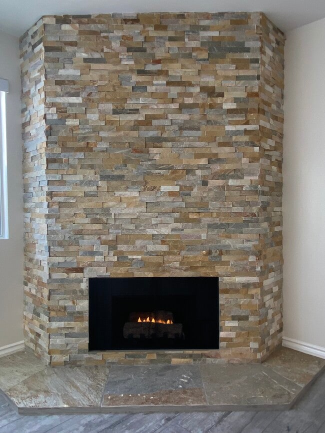 FLOOR TO CEILING STONE GAS FIREPLACE - Large BrighRemodeled 2x2 Unit with Huge Patio