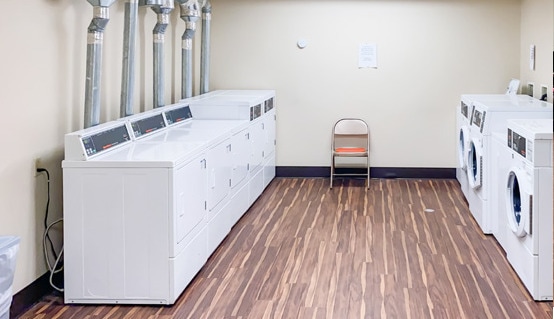 On-Site Laundry Facility - Pine Grove Apartments