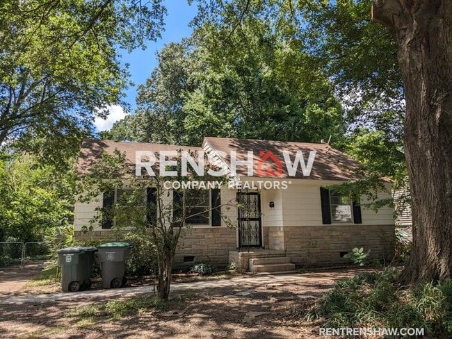 Building Photo - Enchanting 2 Bedroom 1 Bath off Cherry Roa...