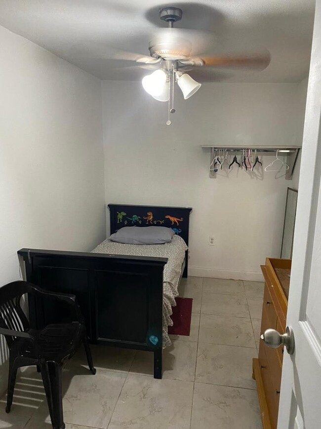 Building Photo - 12401 West Okeechobee Road, Unit 1