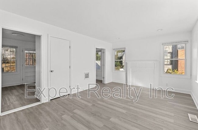 Building Photo - 9036 Beverly Dr N