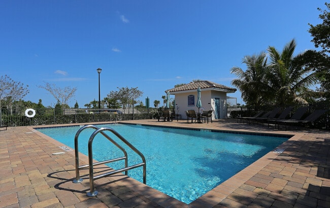 Cool off and unwind at our sun-drenched poolside retreat. - Bridgewater at Lake Osborne