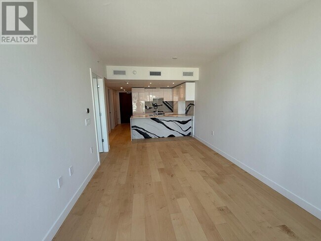 Photo du bâtiment - 135-1135 13th St E
