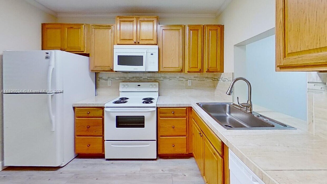 7406 Woodmont Terrace Unit 205, Tamarac, FL 33321 Condo for Rent in