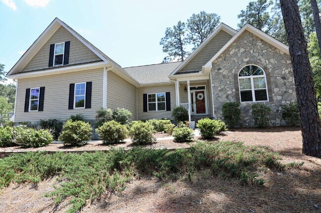 Foto del edificio - “Stunning 4-Bedroom Retreat with Granite Elegance at 2 River Drive, Pinehurst"