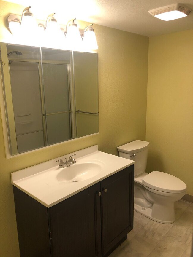 Building Photo - Updated Four Bedroom Home with New Lawn an...