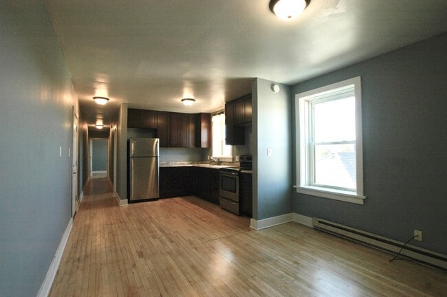 Kitchen from living and view down hall - 108 King St