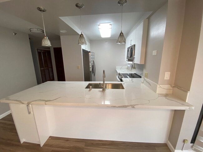 Building Photo - For Rent - 5090 Likini St. #1506