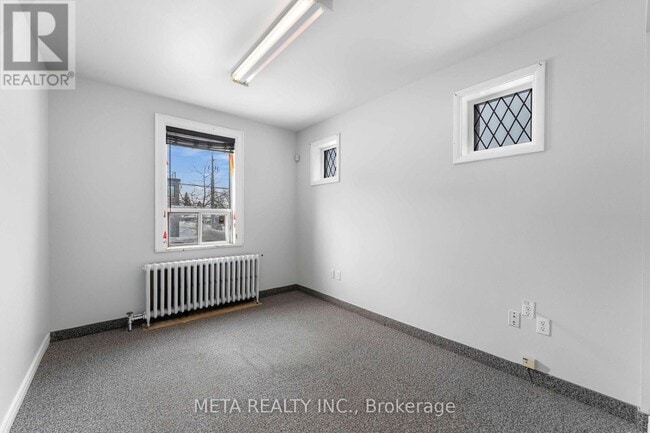 Building Photo - 1641 Victoria Park Ave