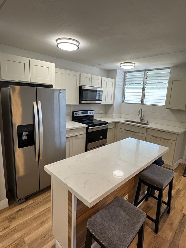 Building Photo - Lusitana Gardens 1 bed/1 bath/1 parking - Utilities included