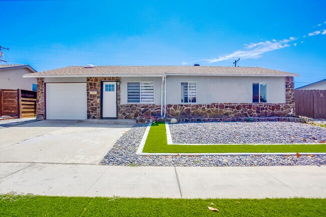 A vibrant, well-maintained lawn welcomes you to this single-storey home - 4258 Feather Ave