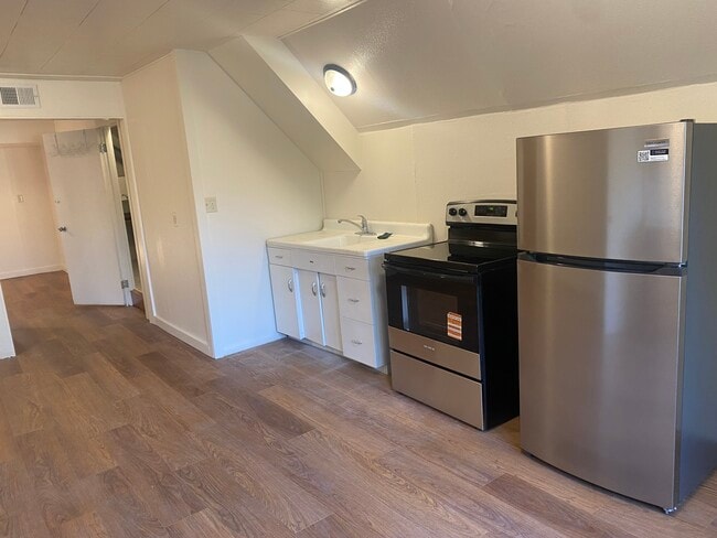 Open concept Single wall kitchen - 2550 N 45th St