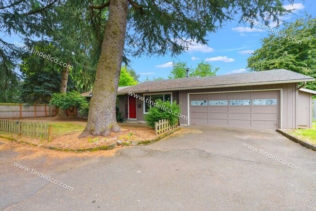 Building Photo - Private Cully Neighborhood 3 Bedroom 2 Bathroom Home - Attached Garage & Fenced Yard!