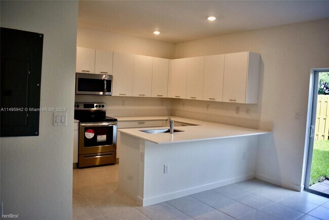 Building Photo - 3 br, 2.5 bath House - 12207 NW 23rd Ct