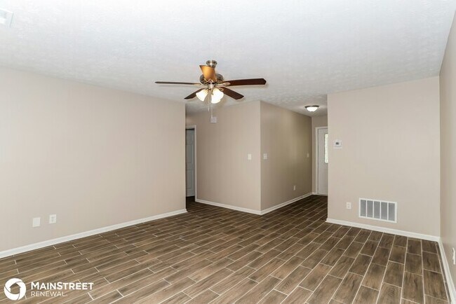 Building Photo - 9073 Woodgreen Way