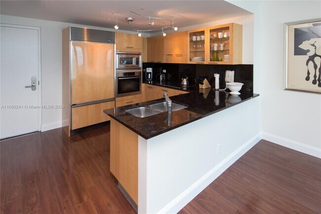 Building Photo - 6799 Collins Ave