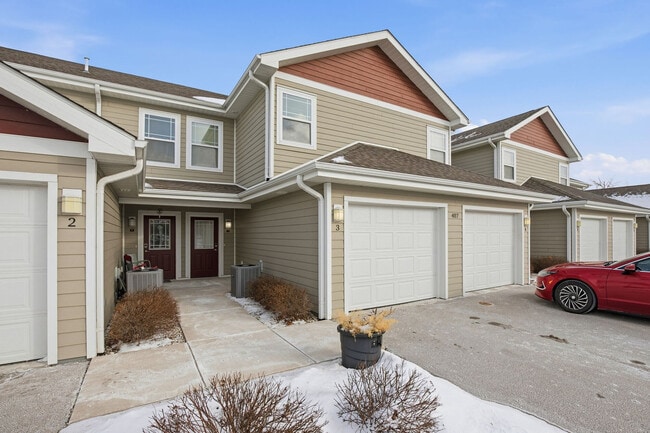 Building Photo - Whispering Echoes Townhomes