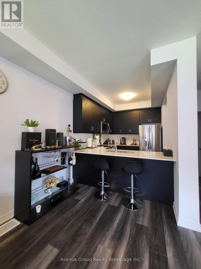 Photo du bâtiment - 575 Woodward Ave