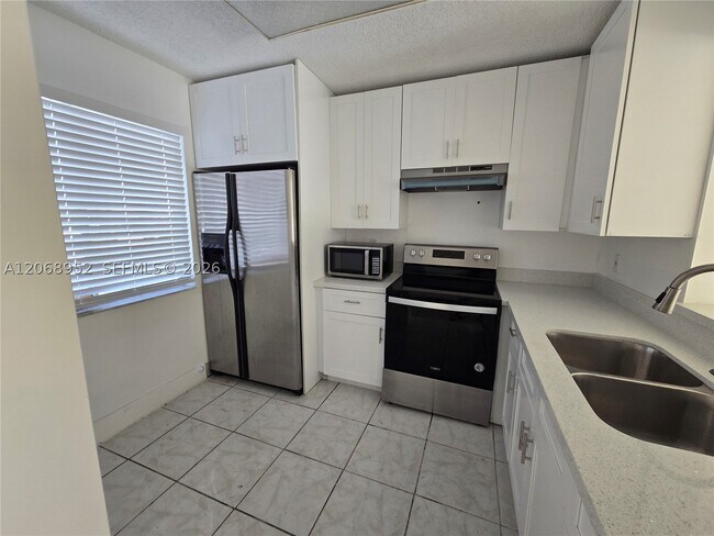 Building Photo - 8700 N Sherman Cir