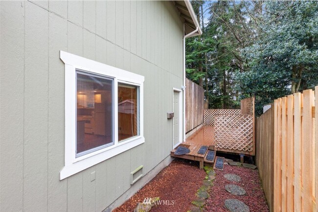 Your own entrance located on side of main home! - 9330 15th St SE