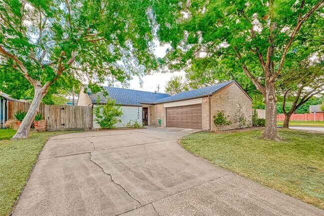 Foto del edificio - 11802 Poplar Creek Dr