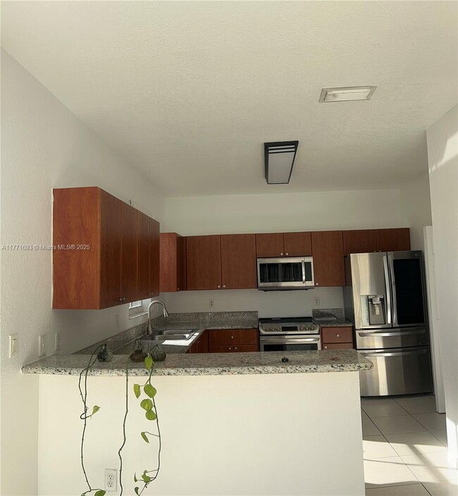 Foto del edificio - 4409 NW 113th Ct