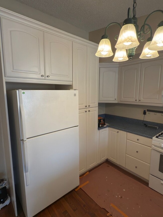 Building Photo - Nicest Unit at Plaza West..with grounds li...