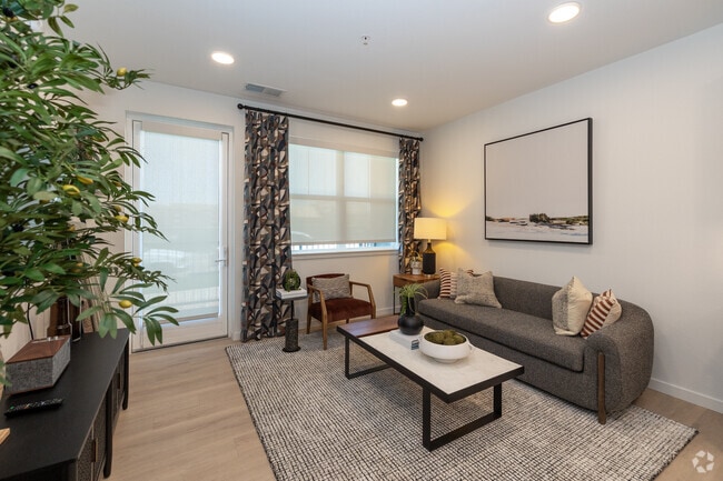 1BR, 1BA - 833SF - Living Room - Sabine