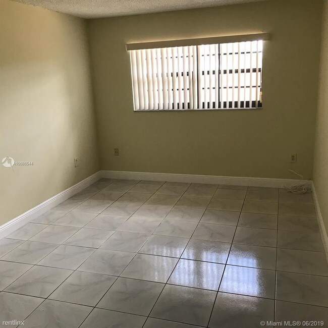 Building Photo - 3 br, 2 bath House - 9351 SW 4th Ln # 0