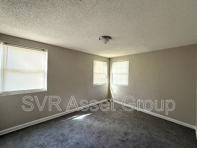 Building Photo - 9073 11th Ave