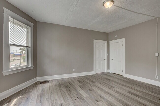 Building Photo - 1214 Iliff Ave