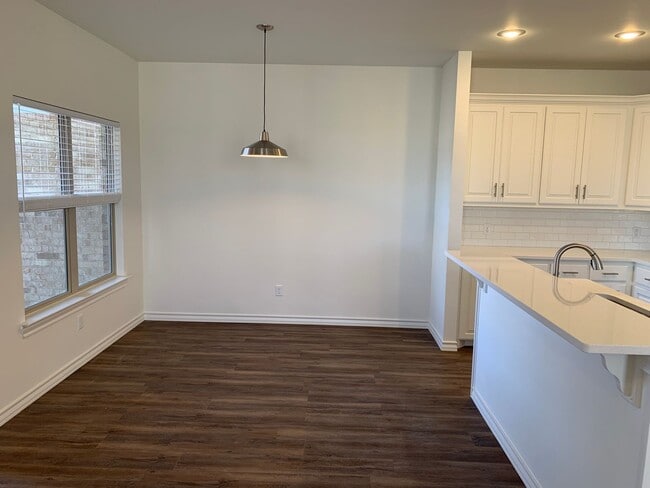 Building Photo - Beautiful brand new!! All the bells and wh...