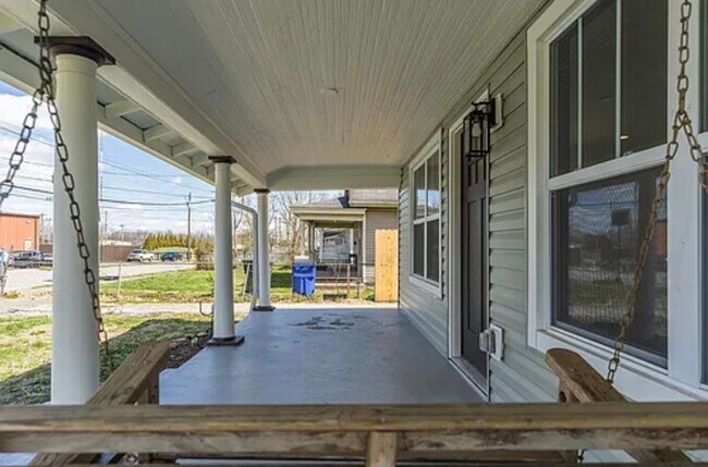 Building Photo - Fully Renovated 2BR/2BA with Garage – Walk to West Sixth & Legacy Trail