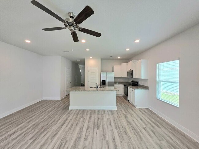 Foto del edificio - 8742 Meadow Flower Ln